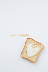 sandwich for breakfast in form of heart with cheese - good morning inscription