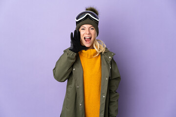 Skier Russian girl with snowboarding glasses isolated on purple background shouting with mouth wide open