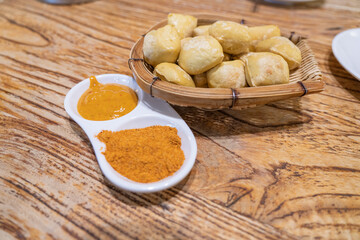 spices in a bowl with fried toufu