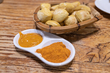 spices in a bowl with fried toufu