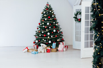 Christmas tree with gifts decor garland interior new year