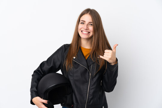 Woman with a motorcycle helmet making phone gesture