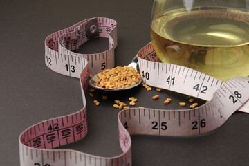 Close up of Fenugreek with its seeds and powder and the extracted water. It helps in numerous...