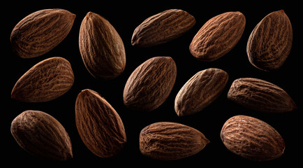 Almond nuts on black background, nuts collection