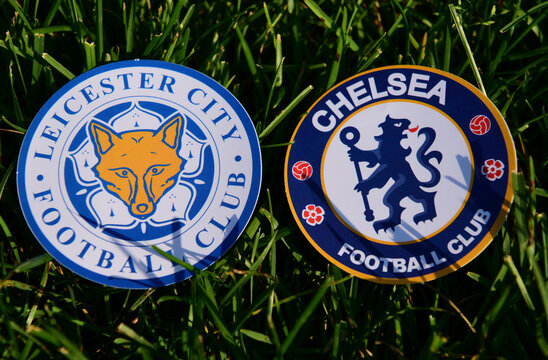 September 6, 2019 London, UK. Emblems Of English Football Clubs Chelsea London And Leicester City On The Green Lawn Grass.