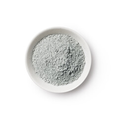Cosmetic clay powder in white bowl