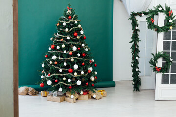 Christmas tree with gifts decor garland interior new year