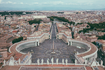 Panoramic view on the St. Peter's square and city of Rome from Papal Basilica