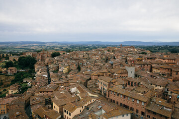 Fototapeta na wymiar Panoramic view of Siena city with historic buildings and streets