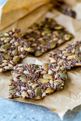 Turkish Homemade Cracker Snacks Biscuit with Sunflower Seeds, Sesame and Dill. Crispy Yaprak Galeta in Craft Paper.