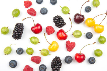 Assorted fresh different berries on a white background. useful vitamin healthy food fruit. healthy vegetable breakfast
