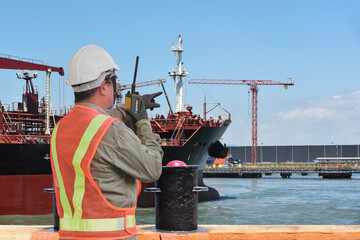 port controller, harbor master in command on the terminal port for safety and control security...