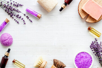 Frame of lavender cosmetics products with natural essential oil and herbs salt