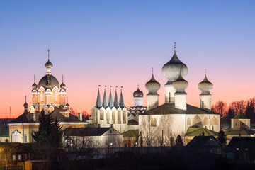 Fototapeta na wymiar Tikhvin assumtion monastery. Russian Orthodox monastery founded in 1560. Evening beautiful landscape with a lighted monastery. Tikhvin, Leningrad region, Russia