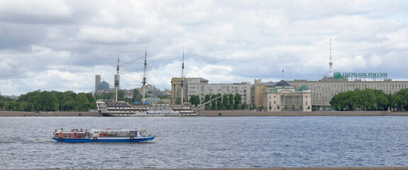 Boat with tourists sailing on the Neva River in St. Petersburg