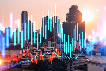 Fototapeta na wymiar Glowing FOREX graph hologram, aerial panoramic cityscape of Bangkok at sunset. Stock and bond trading in Asia. The concept of fund management. Double exposure.