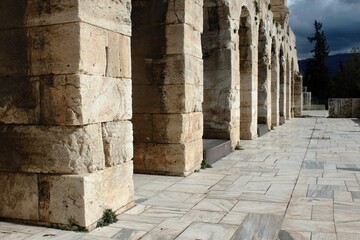 Fototapeta premium Stonemade arches on the facade of Herodes Atticus Odeon in Athens, Greece.
