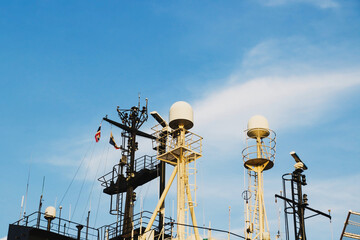 Battle ship radar on navigation deck of cargo ship © TawanSaklay