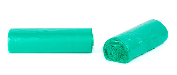 Green roll of plastic garbage bags isolated on white background