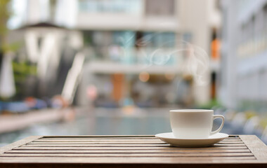 Close up coffee espresso on wood table nature background in garden,