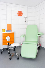 Modern and comfortable equipped hospital room. Treatment room with medicine in the fridge.