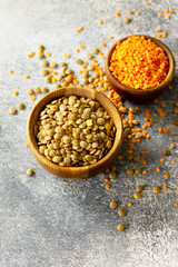 Healthy food, dieting, nutrition concept, vegan protein source. Raw of legumes red lentils and canadian lentils. Copy space.