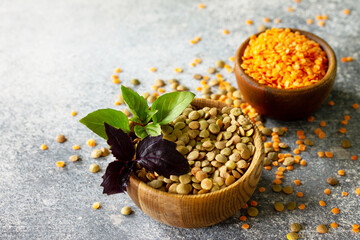 Healthy food, dieting, nutrition concept, vegan protein source. Raw of legumes red lentils and canadian lentils.