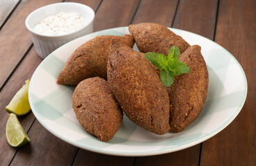 Traditional arabic fried kibbeh. Typical brazilian snack