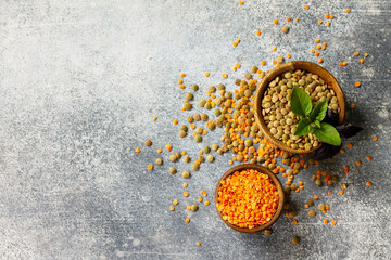 Healthy food, dieting, nutrition concept, vegan protein source. Raw of legumes red lentils and canadian lentils. Flat lay top view. Copy space.