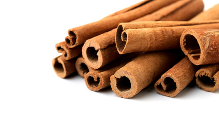 Cinnamon close up on a white background