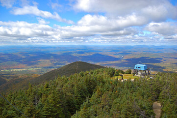 Fototapeta na wymiar Franconia Notch with fall foliage and Mount Lafayette aerial view from top of the Cannon Mountain in Franconia Notch State Park in White Mountain National Forest, near Lincoln, New Hampshire NH, USA. 