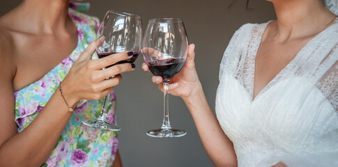 bride and groom holding champagne