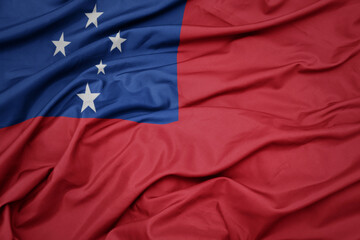 waving colorful national flag of Samoa .