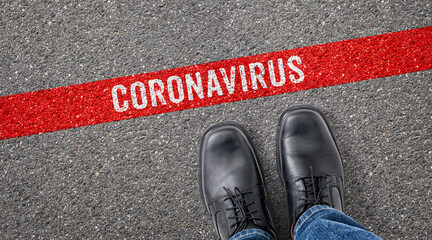 Red line on asphalt - Coronavirus