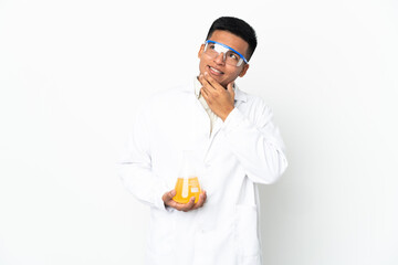 Young Ecuadorian scientific man looking up while smiling