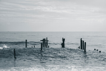 old pier and sea waves