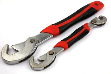 Adjustable wrench,  wrench snap and grip on white background.