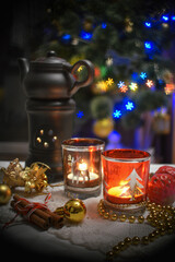 christmas still life with candles and decorations