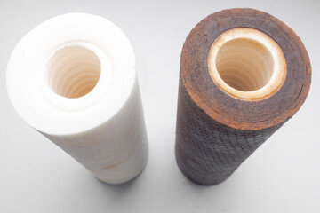 Water filter cartridge white new and used with rusty, reverse osmosis system