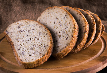 slices of sliced bread, still life on a rustic background