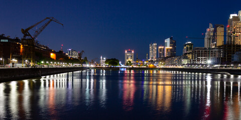 Fototapeta premium Tourism in Buenos Aires. Puerto Madero at night. The most modern and luxurious neighborhood in Buenos Aires shows all its glamor at night. 