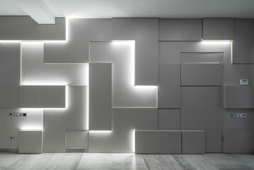 Contemporary interior of luxury apartment. Modern hi-tech geometric design of wall with lamps.
