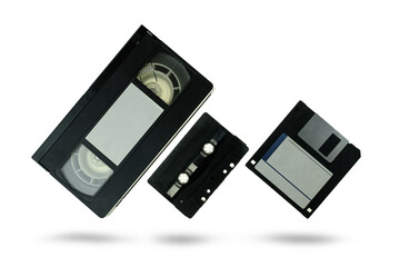 Videocassette audio cassette tape and floppy disk on white background with clipping path
