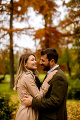 Young couple in the autumn park