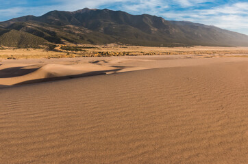 Wind Blown Sand Dunes and The Sangre de Christo Mountains, Great Sand Dunes National Park, Colorado, USA