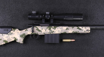 sniper rifle isolated on black background