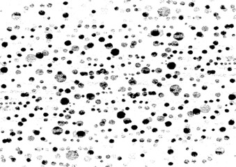 Small uneven spots and particles of debris. Abstract vector texture.  Distressed uneven background. Grunge texture overlay with fine grains isolated on white background. Vector illustration. EPS10.