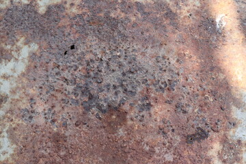 Rusty steel plate or damage metal for backgrounds and textures design closeup.