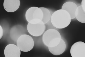 Black and white bokeh is used as a background in various festivals.