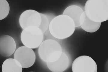 Black and white bokeh is used as a background in various festivals.